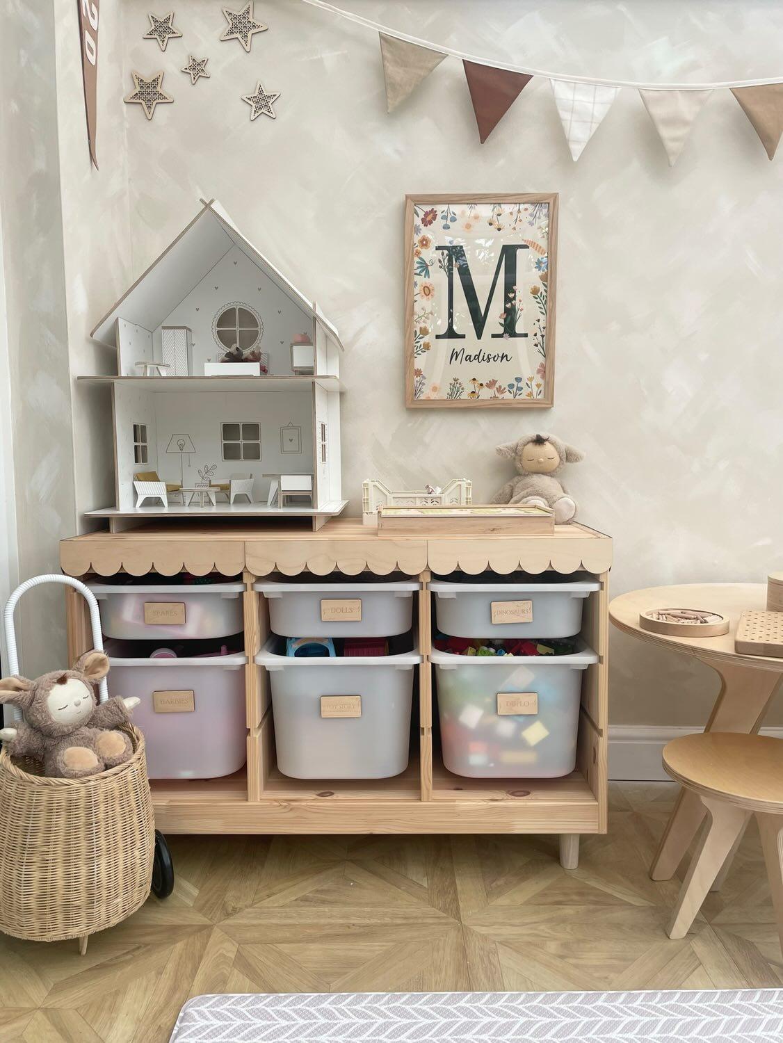 plywood scallop trims on a trofast toy storage unit