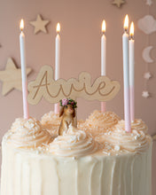 Load image into Gallery viewer, wooden engraved cake topper on a white cake with sprinkles
